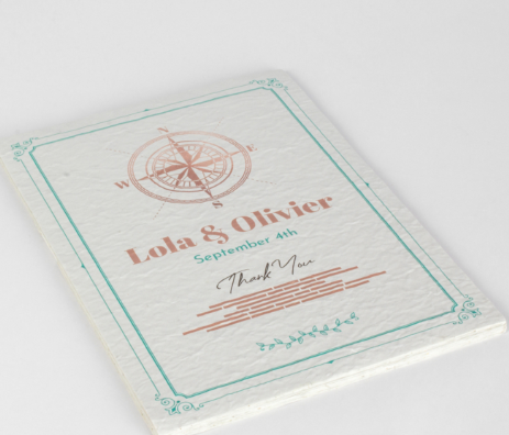 Detalle de tarjetas de visita papel con semillas de flores